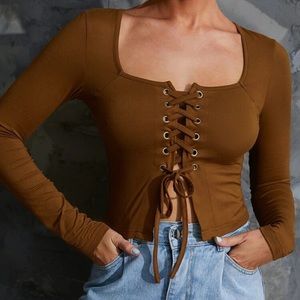 Beautiful rustic brown crop top that ties down the front